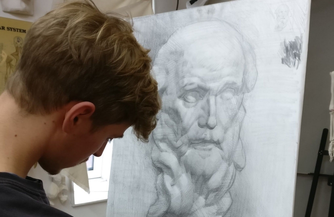 Andreas W. tegner efter buste